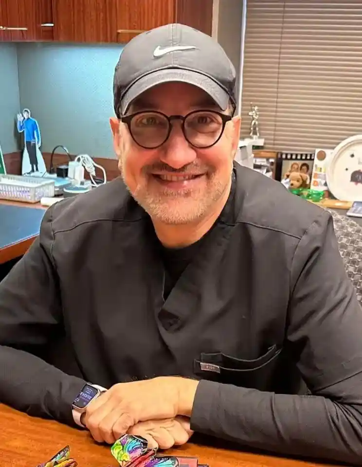 Dr. Stephan H. Parker, orthodontist in Mayfield, OH, smiling in his dental office.